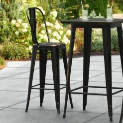 LT&S Alloy Series Lancaster Table & Seating Alloy Series Distressed Copper Metal Indoor / Outdoor Industrial Cafe Barstool With Vertical Slat Back And Drain Hole Seat