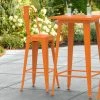 LT&S Alloy Series Lancaster Table & Seating Alloy Series Orange Metal Indoor / Outdoor Industrial Cafe Barstool With Vertical Slat Back And Drain Hole Seat
