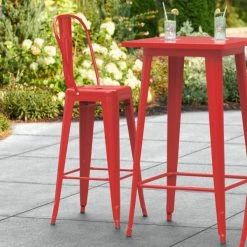 LT&S Alloy Series Lancaster Table & Seating Alloy Series Red Metal Indoor / Outdoor Industrial Cafe Barstool With Vertical Slat Back And Drain Hole Seat