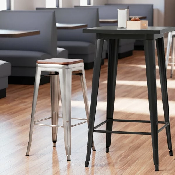 LT&S Alloy Series Lancaster Table & Seating Alloy Series Clear Coated Metal Indoor Industrial Cafe Bar Height Stool With Walnut Wood Seat 1 LT&S Alloy Series Lancaster Table & Seating Alloy Series Clear Coated Metal Indoor Industrial Cafe Bar Height Stool With Walnut Wood Seat