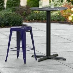 LT&S Alloy Series Lancaster Table & Seating Alloy Series Navy Stackable Metal Indoor / Outdoor Industrial Cafe Counter Height Stool With Drain Hole Seat