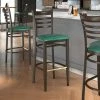 LT&S Spartan Series Lancaster Table & Seating Spartan Series Bar Height Metal Ladder Back Chair With Walnut Wood Grain Finish And Green Vinyl Seat