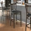 LT&S Spartan Series Lancaster Table & Seating Spartan Series Bar Height Metal Slat Back Chair With Walnut Wood Grain Finish And Black Vinyl Seat