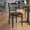 LT&S Spartan Series Lancaster Table & Seating Spartan Series Metal Slat Back Chair With Walnut Wood Grain Finish And Black Vinyl Seat