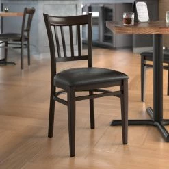 LT&S Spartan Series Lancaster Table & Seating Spartan Series Metal Slat Back Chair With Walnut Wood Grain Finish And Black Vinyl Seat