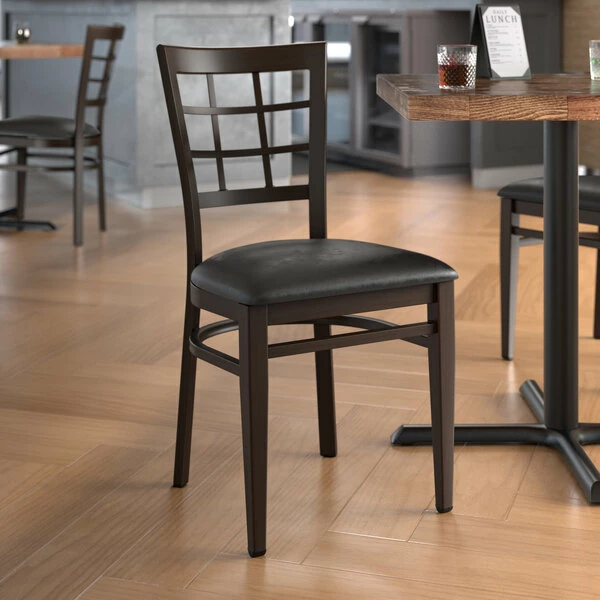 LT&S Spartan Series Lancaster Table & Seating Spartan Series Metal Window Back Chair With Walnut Wood Grain Finish And Black Vinyl Seat 1 LT&S Spartan Series Lancaster Table & Seating Spartan Series Metal Window Back Chair With Walnut Wood Grain Finish And Black Vinyl Seat