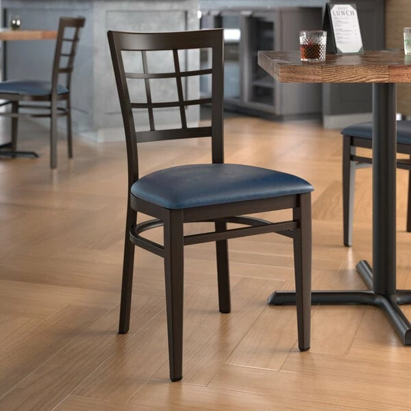 LT&S Spartan Series Lancaster Table & Seating Spartan Series Metal Window Back Chair With Walnut Wood Grain Finish And Navy Vinyl Seat 1 LT&S Spartan Series Lancaster Table & Seating Spartan Series Metal Window Back Chair With Walnut Wood Grain Finish And Navy Vinyl Seat